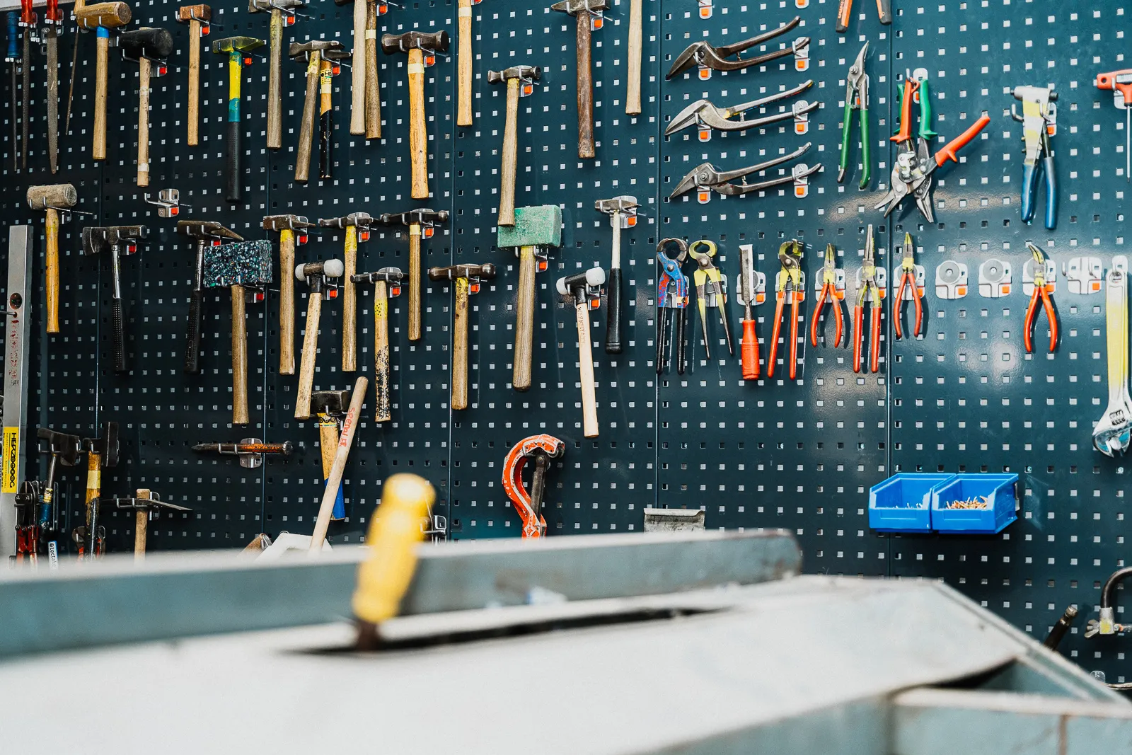 Tool wall in the workshop of Herzog Haustechnik AG, from the corporate picture campaign